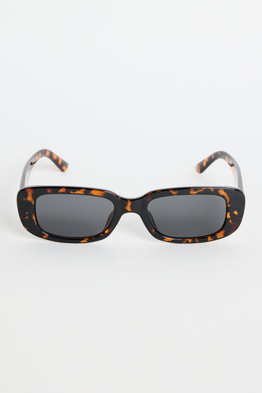 Rectangular brown tortoiseshell sunglasses with dark tinted lenses, photographed on a white background