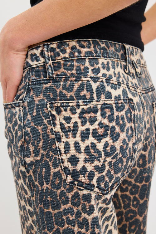 Leopard print jeans with a plain background