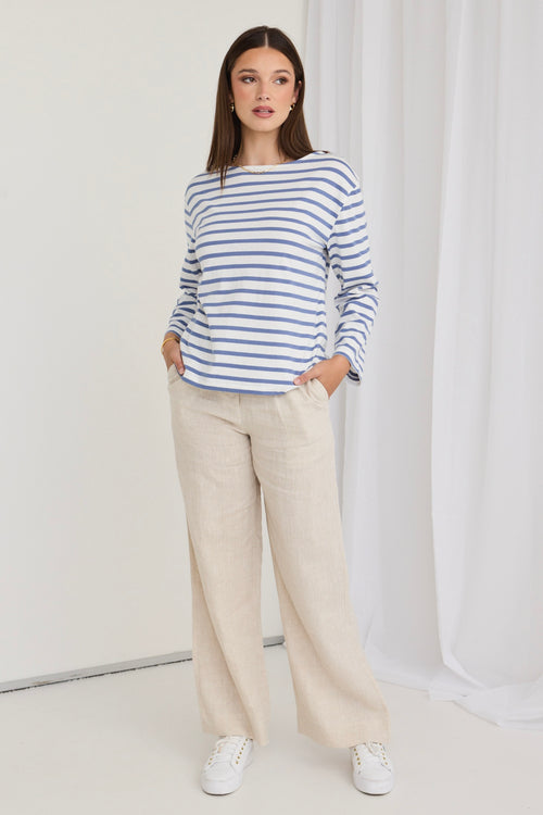 model wears blue and white stripe top
