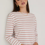 model wears a pink stripe tee