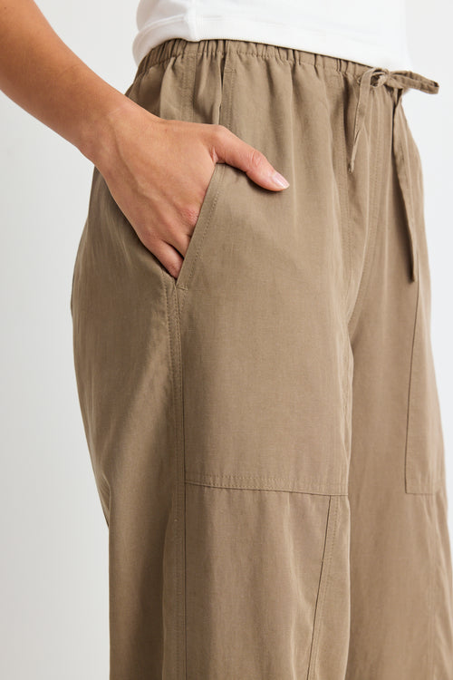 model wears a green cargo pant