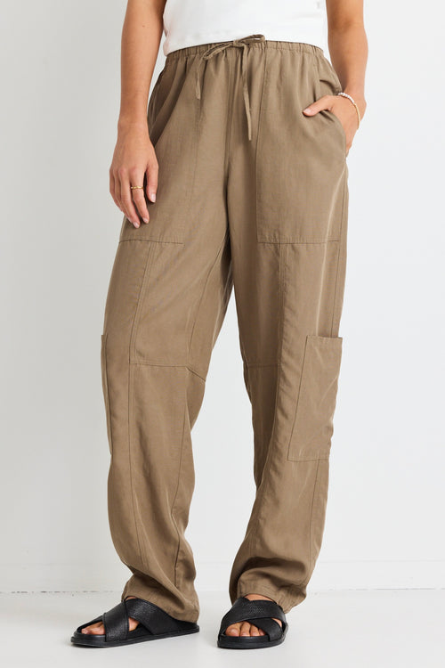 model wears a green cargo pant