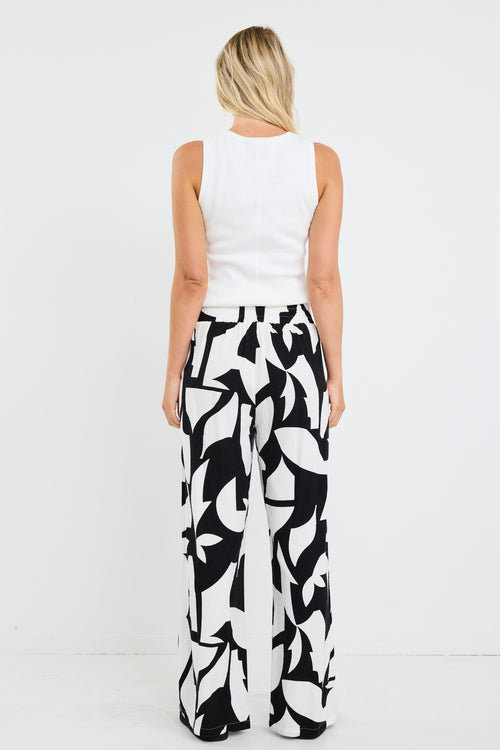 model wearing black white patterned pant
