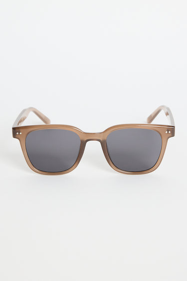 Translucent brown classic square sunglasses with dark tinted lenses, photographed on a white background.