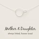 model wears a silver necklace