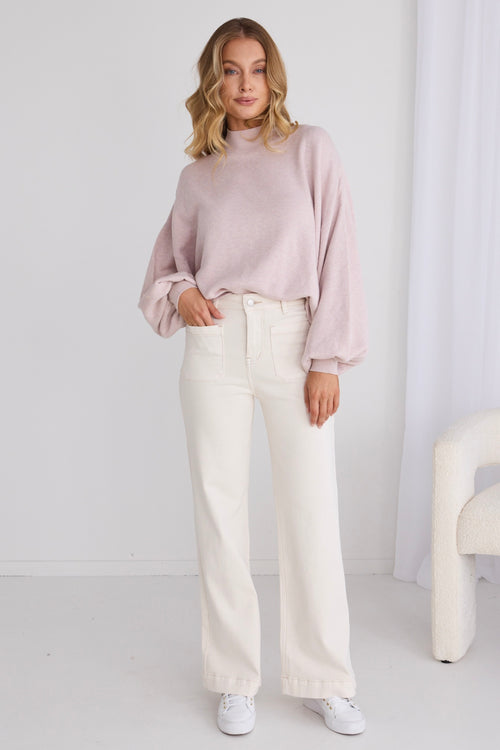 model wears a pink knit