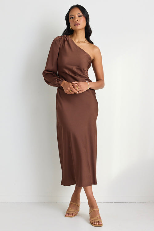 model wears a brown one shoulder midi dress