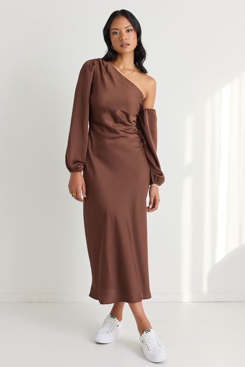 model wears a brown one shoulder midi dress