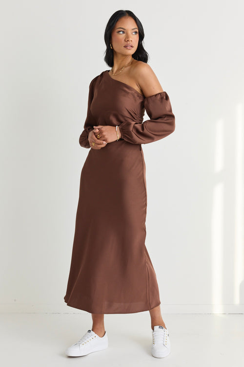 model wears a brown one shoulder midi dress