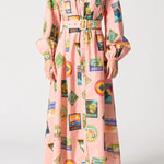 Long dress with colorful vintage-style label print on a white background