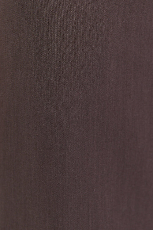 Close-up of brown pants on a white background
col_pattern