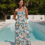 model wearing a blue floral dress