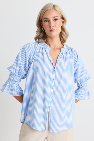 model wears a blue stripe blouse