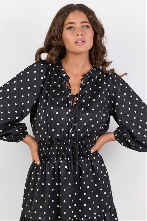 Shop Nuance Black Mini Polka Dot Long Sleeve V Neck Shirred Waist Tier Shop Nuance Black Mini Polka Dot Long Sleeve V Neck Shirred Waist Tier