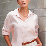 model wears a pink linen shirt