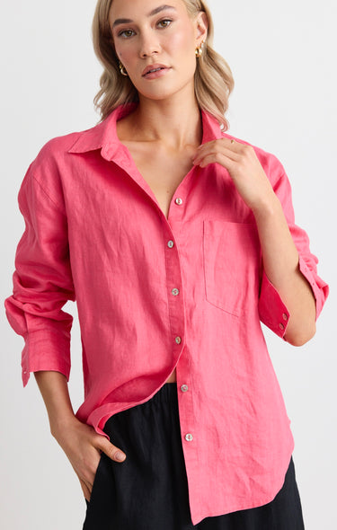 model wears a pink linen shirt 