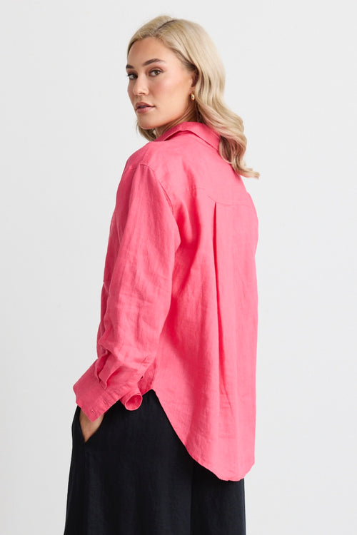 model wears a pink linen shirt 