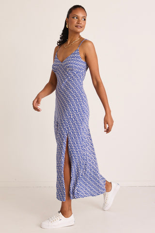 model wears a blue pattern midi dress