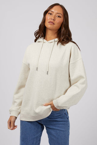 Model wears a white hood jumper