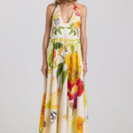 Woman wearing a floral dress on a white background