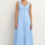 model wears a light blue midi dress