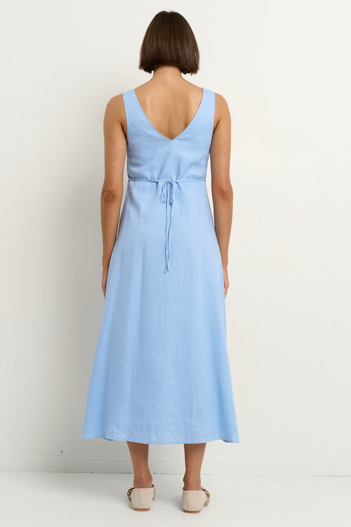 model wears a light blue midi dress