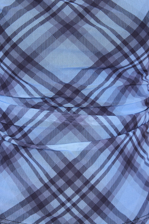 Close-up of blue and gray plaid fabric