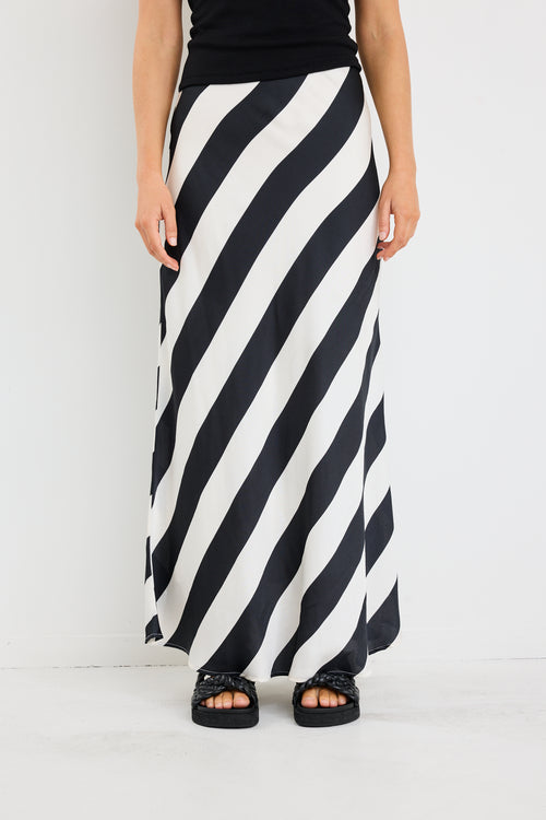 model wearing black white stripe satin maxi skirt
col_pattern