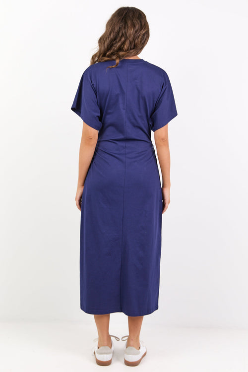 Woman wearing a blue dress on a white background