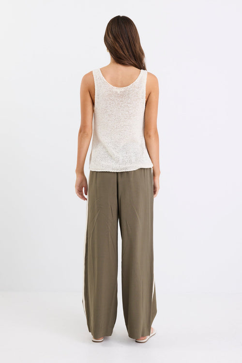 model wearing khaki pant with side stripe and drawstring waist