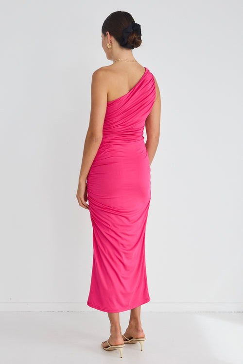model wears a pink one shoulder midi dress