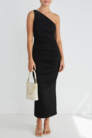 model wears a one shoulder black midi dress