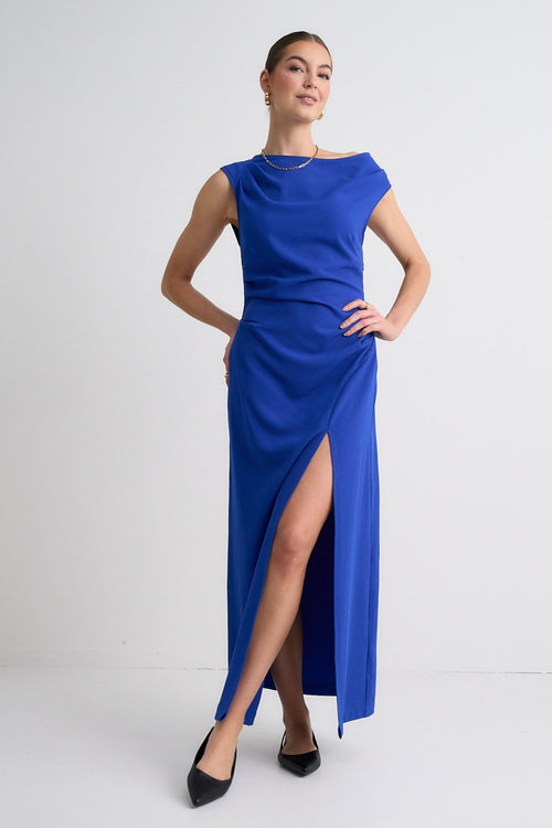 model wears a blue maxi dress