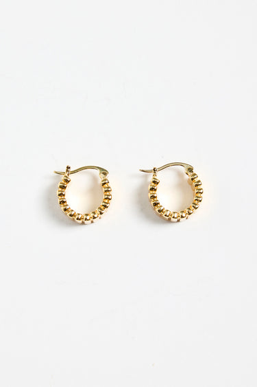gold-plated brass hoop earrings with a ridged texture, photographed flat against a white background.