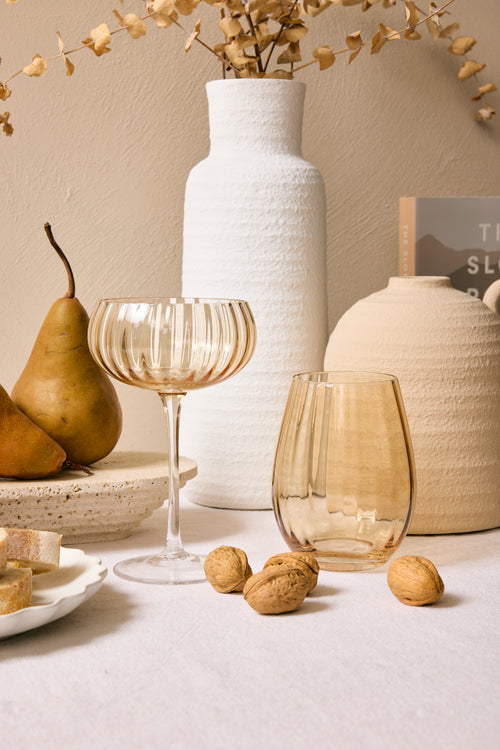 ripple amber glasses on table scape