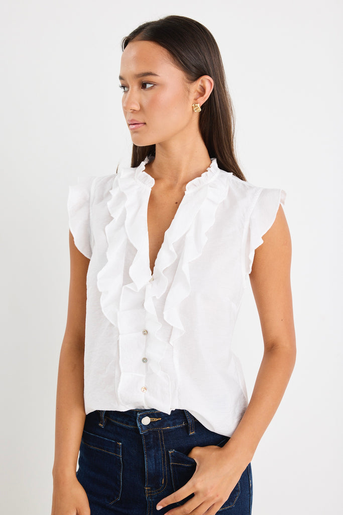 Ritzy Ivory Ruffle Front Sleeveless Top | Flo & Frankie