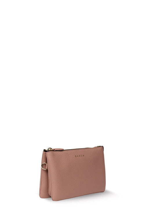 A dusty pink leather clutch bag with a top zipper and a small gold-tone logo on the front, shown against a plain white background.