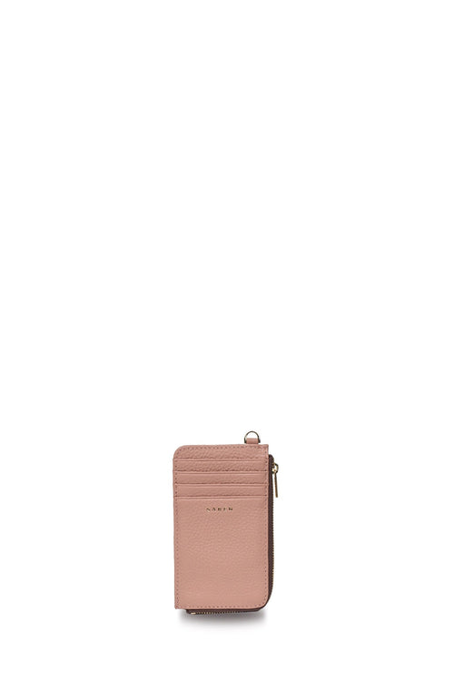A slim, vertical pink leather card holder wallet with a top zipper and a small gold-tone logo plate reading 'LUXE', shown on a plain white background.