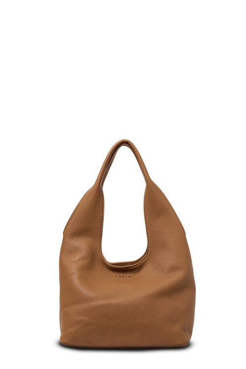 Brown leather handbag on a white background