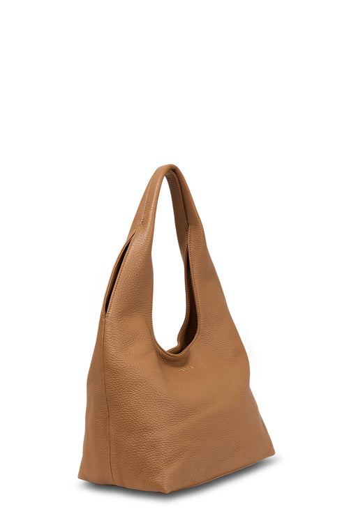 Brown leather handbag on a white background