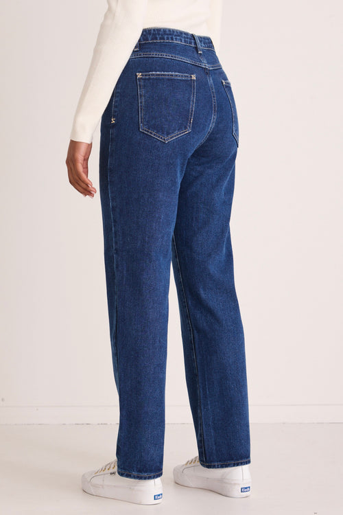 model wears a blue jean