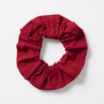 Large plum-coloured linen–cotton scrunchie photographed on a white background.