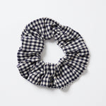 Large navy and white gingham scrunchie with a soft, textured finish, photographed on a white background