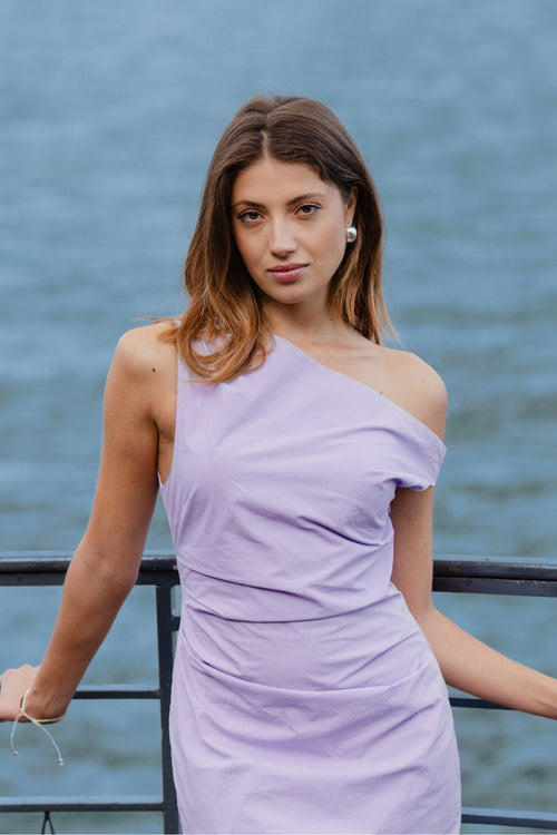 model wears a Purple Off Shoulder Mini Dress