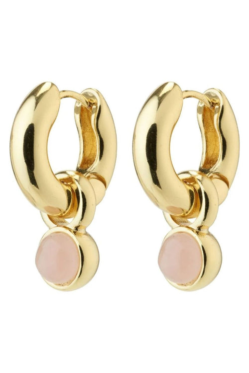Gold hoop earrings with pink stones on a white background