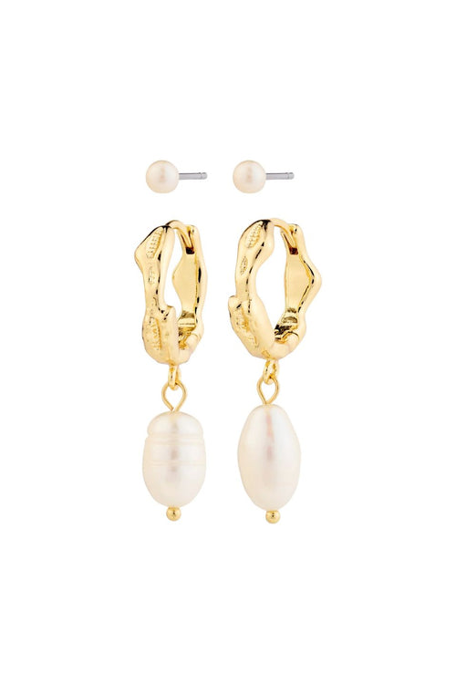 Gold hoop earrings with pearl drops on a white background