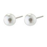Pair of pearl stud earrings on a white background