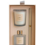 Set of 'Island Bloom' diffuser and candle in a decorative box on a white background