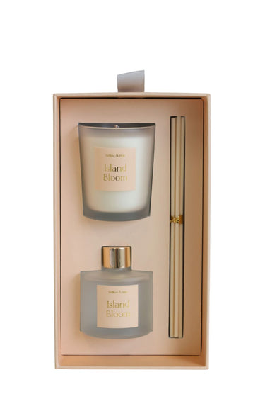 Set of 'Island Bloom' diffuser and candle in a decorative box on a white background
