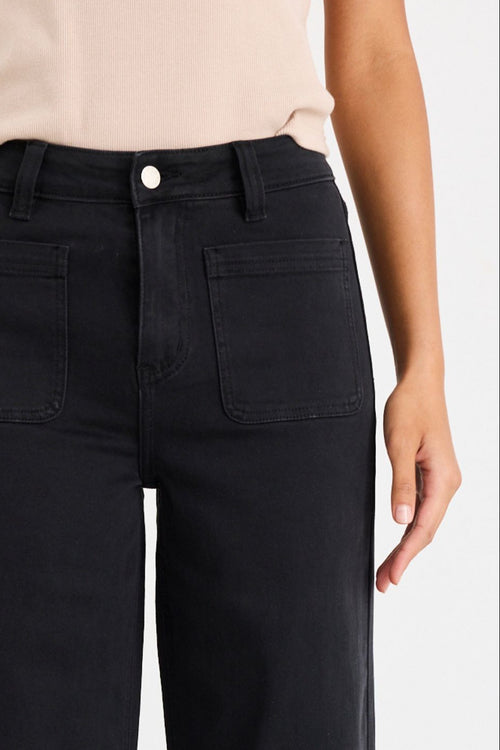 Woman wearing a zoey black jean